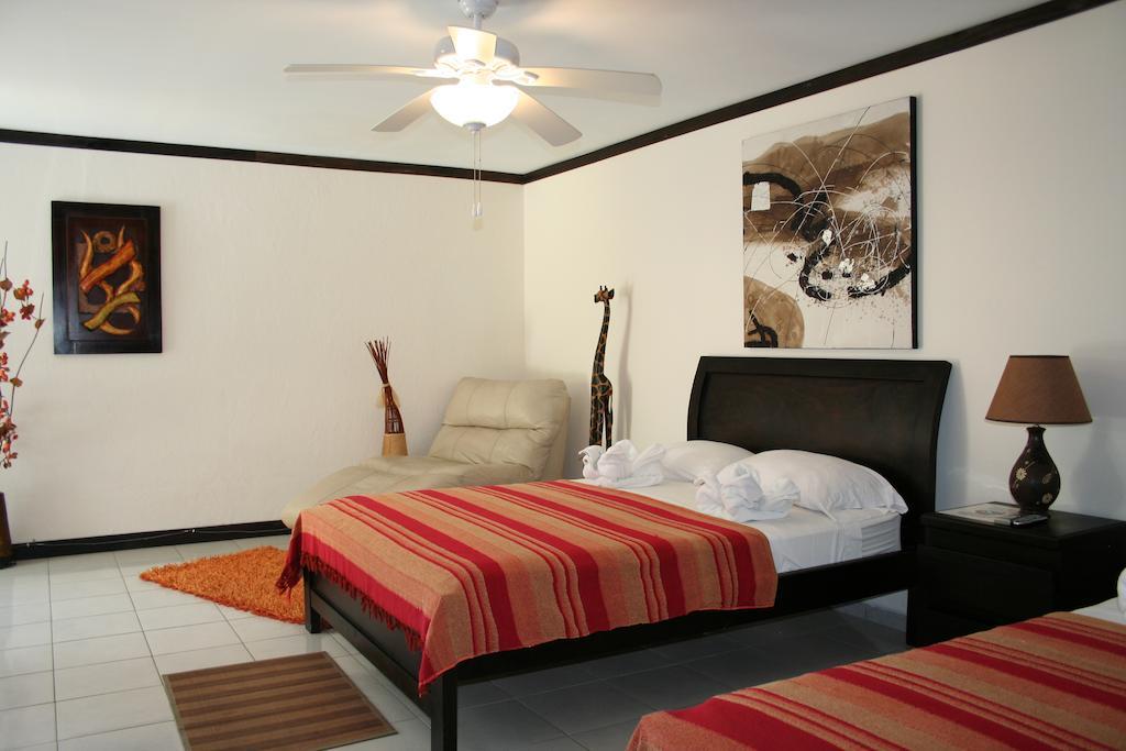 Tuanis Aparthotel Jacó Chambre photo
