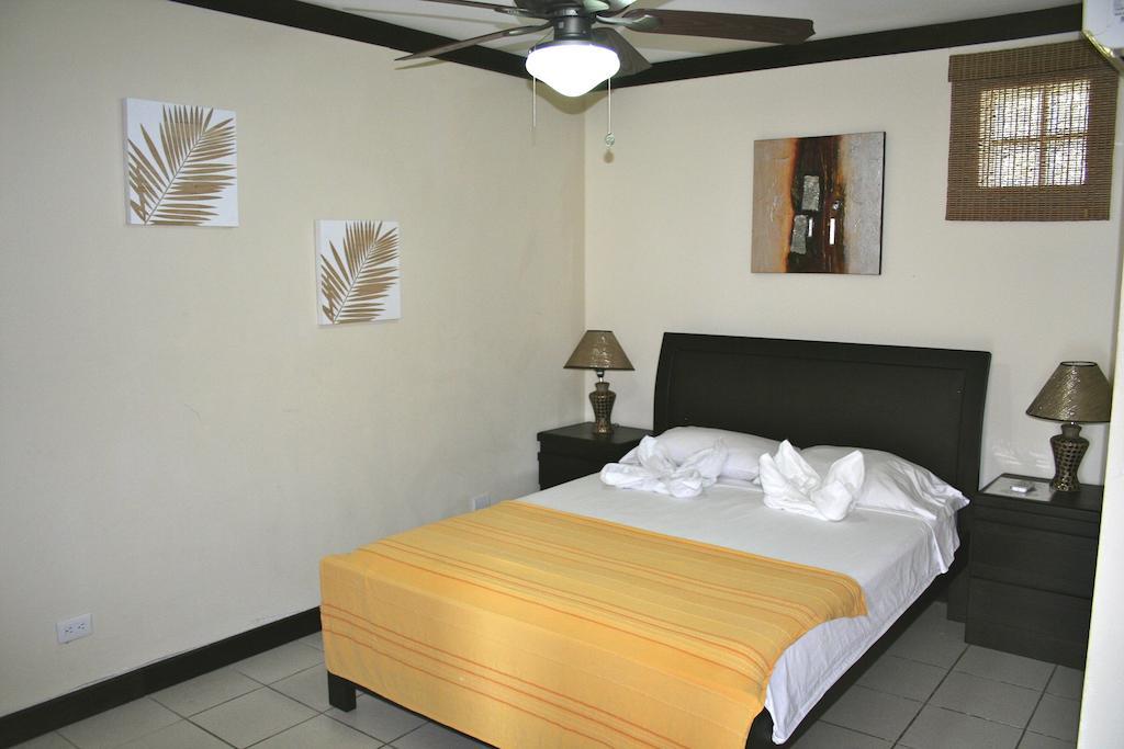 Tuanis Aparthotel Jacó Chambre photo
